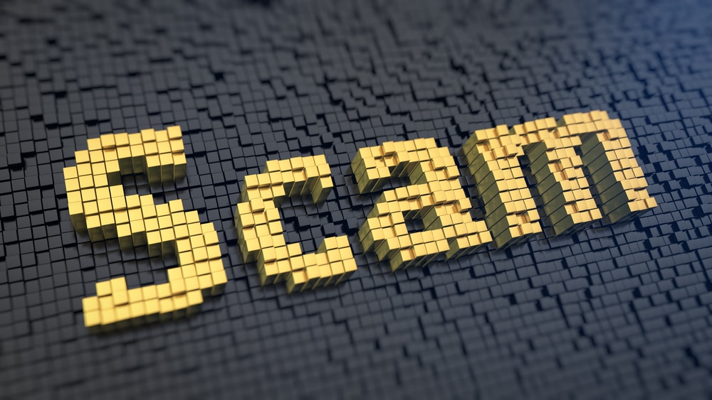 The word SCAM made of multiple little blocks 
