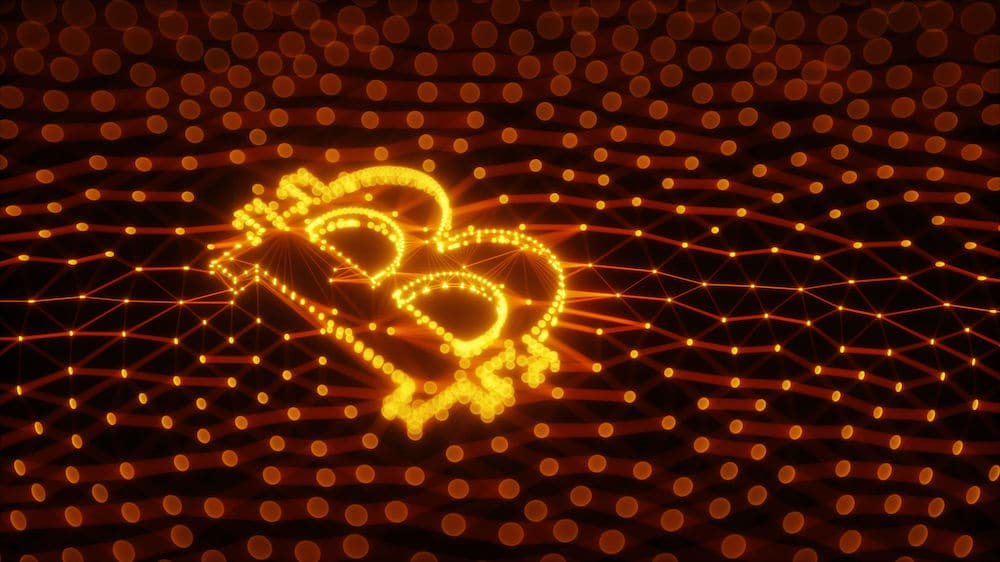 Bitcoin logo made of small lights