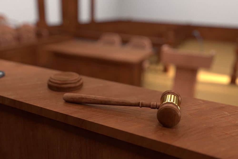 Court judge's mallet laying on the desk