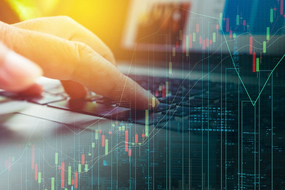 Image of a laptop and a Forex Price Chart