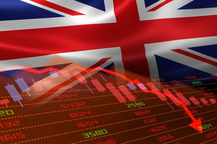 Great Britains flag on top of a stock market trading screen 