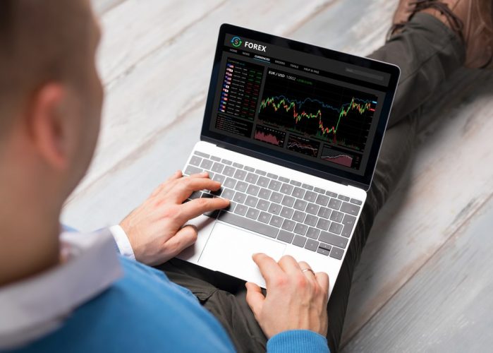 Forex Price Graphs on a Laptop screen 