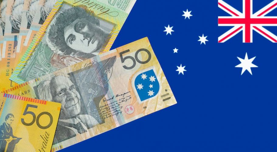 Different European currency bills on top of Australian flag 