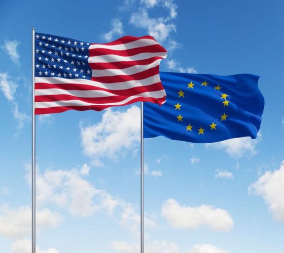USA and European Union Flags on mast 