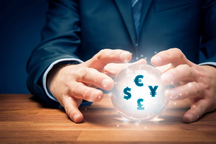 Man in suit holding a crystal ball with currency symbols inside